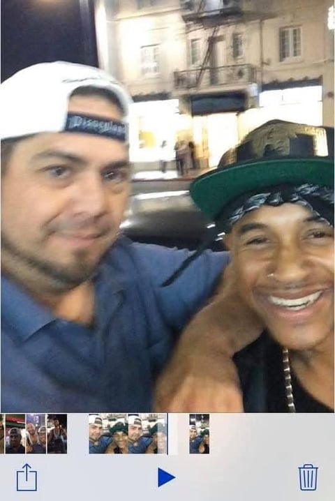 Two men smiling at camera
