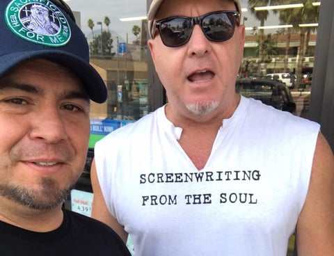 Two men posing for a selfie