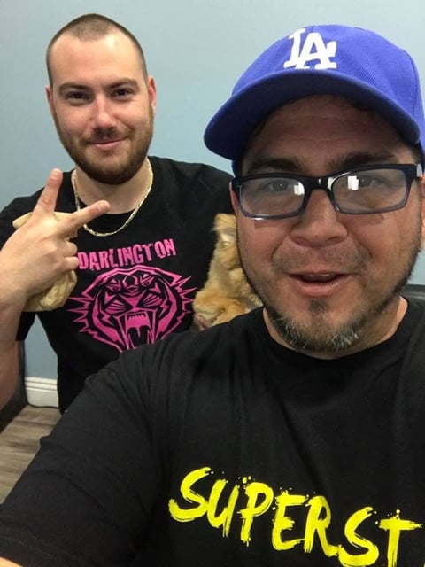 Two men posing for a selfie